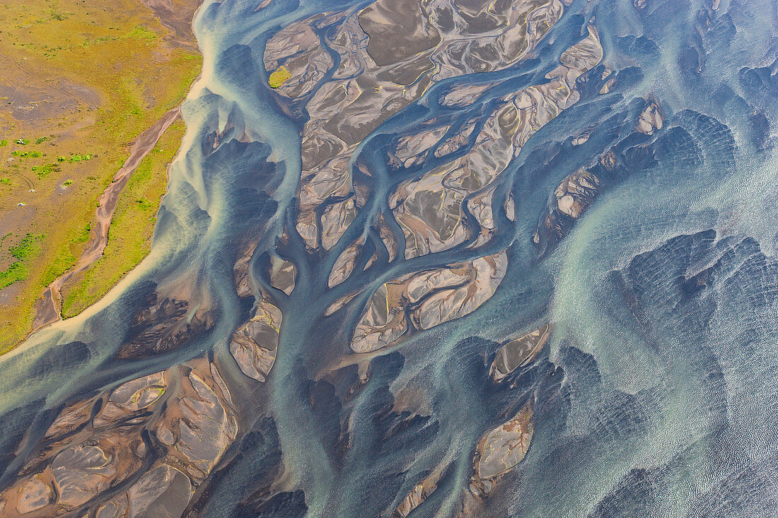 Aerial view of Hosa river coloured by glacial melt, South West Iceland