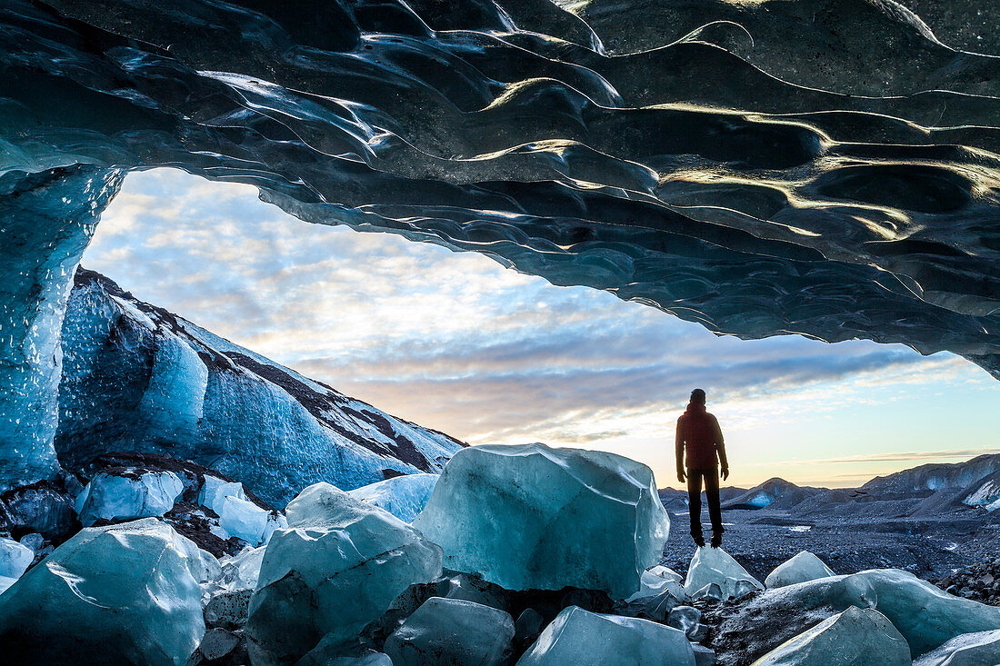 Glacial Ice Cave, Svinafellsjokull glacier, Skaftafell National Park, Iceland. Model Released.