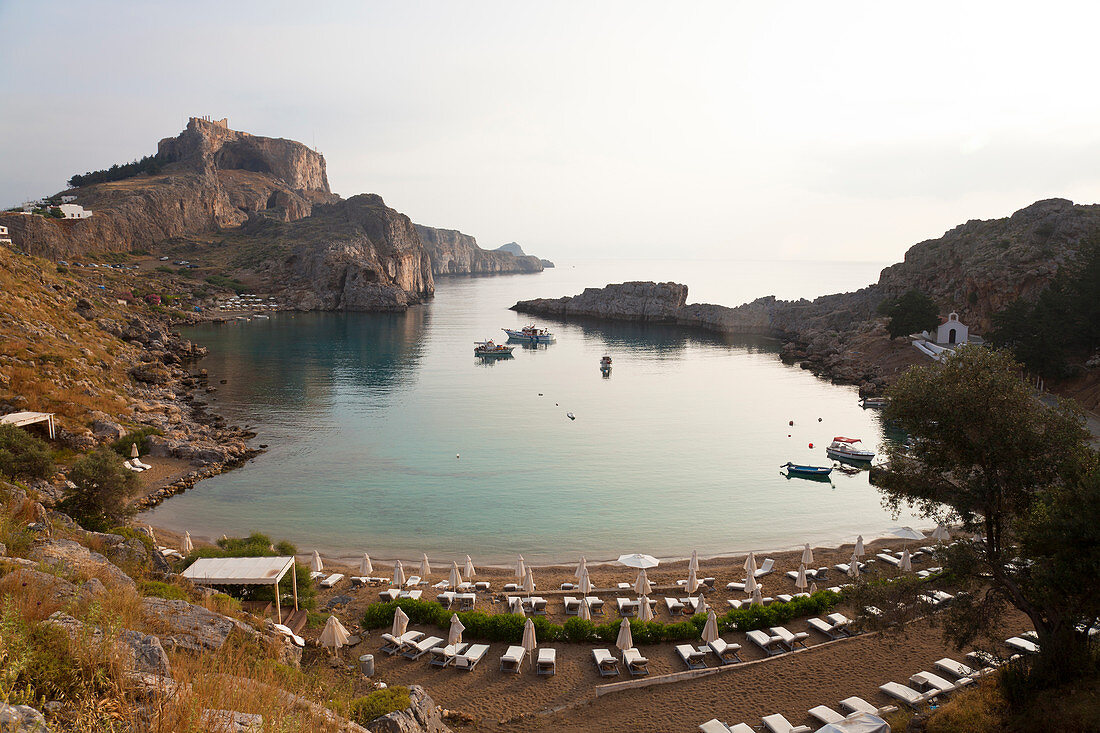 St Pauls Harbour, beach and Acropolis, Lindos Rhodes Greece