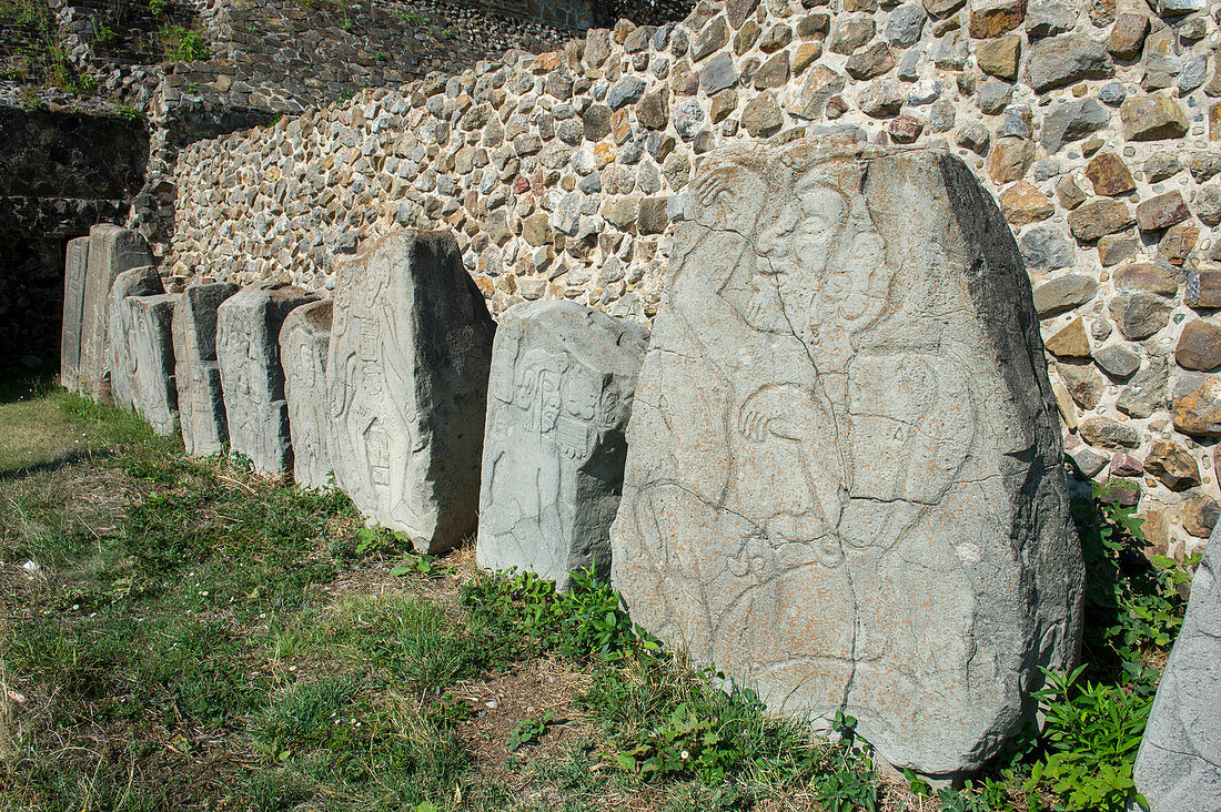 Stones of the Dancers, in the Plaza of the Dancers, next to Building L at Monte Alban (UNESCO World Heritage Site), which is a large pre-Columbian archaeological site in the Valley of Oaxaca region, Oaxaca, Mexico.