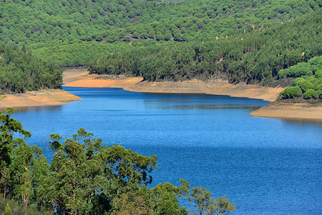 A reservoir surrounded by hills and forest, near Marmelete, Algarve, Portugal