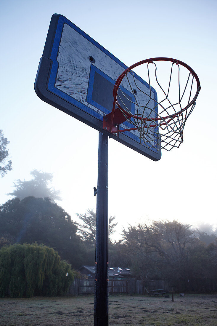 Basketball hoop in the morning light at Point Reyes, California, USA.