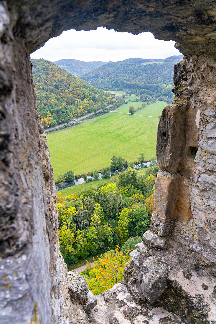 Blcik through a wall opening of the Neideck castle ruins on the Wiesenttal, Franconia, Bavaria, Germany