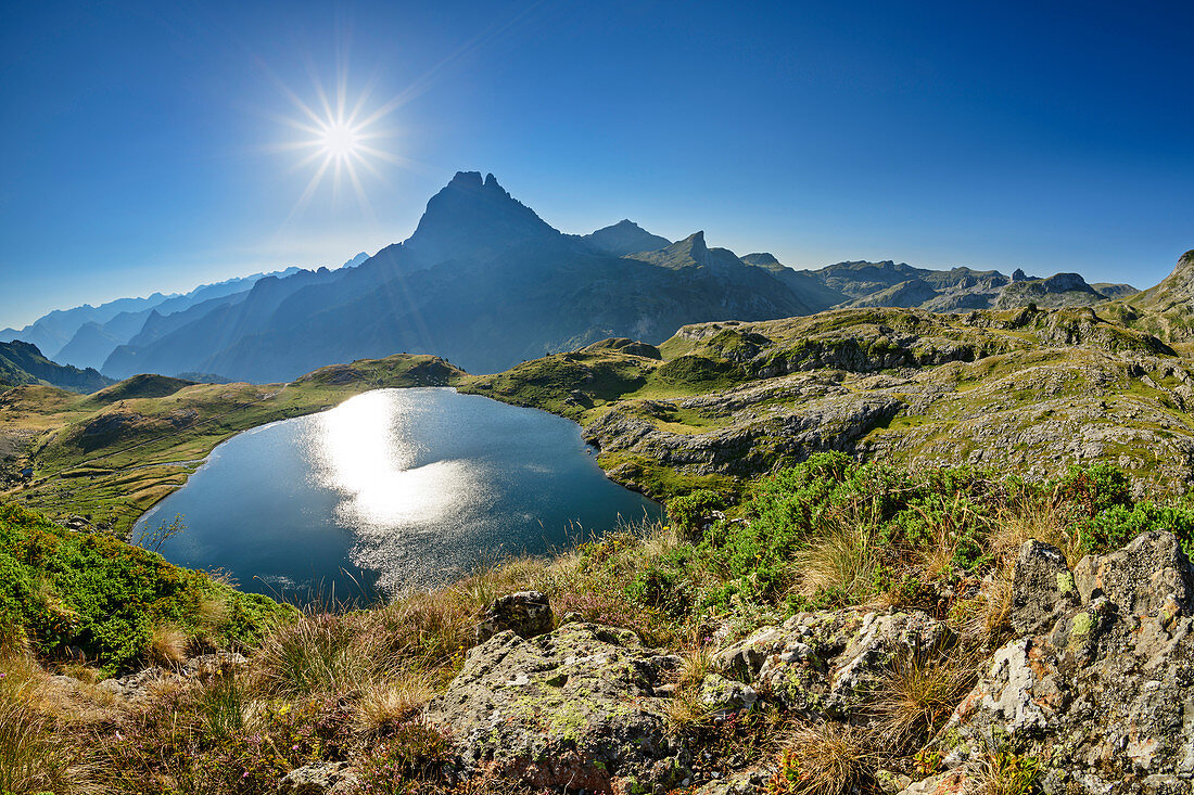 Deep view of Lac Roumassot and Pic du Midi d´Ossau, Lac Roumassot, Pyrenees National Park, Pyrénées-Atlantiques, Pyrenees, France