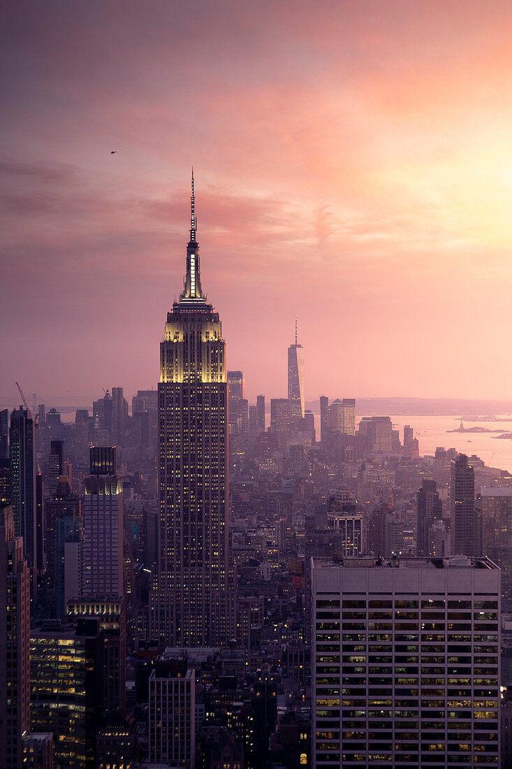 New York city Skyline with Empire State Building and Liberty Tower during sunset, from Top Of The Rock Building. 