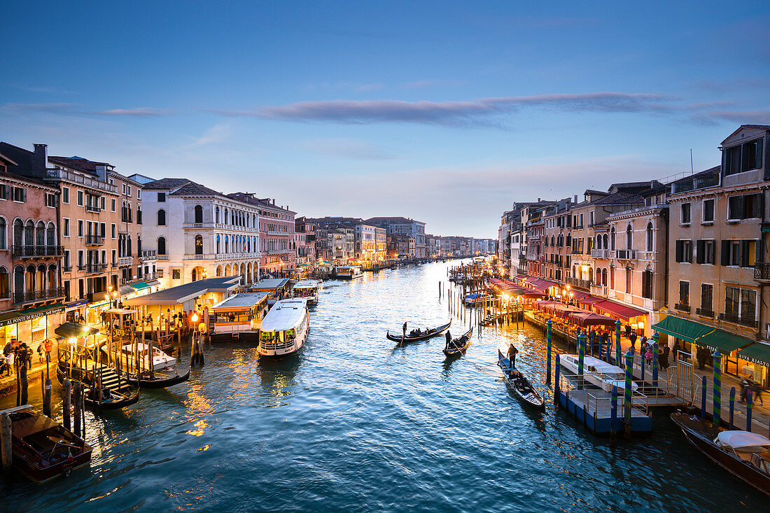 Canal grande at sunset near Rialto Bridge, Venice, Veneto, Italy.