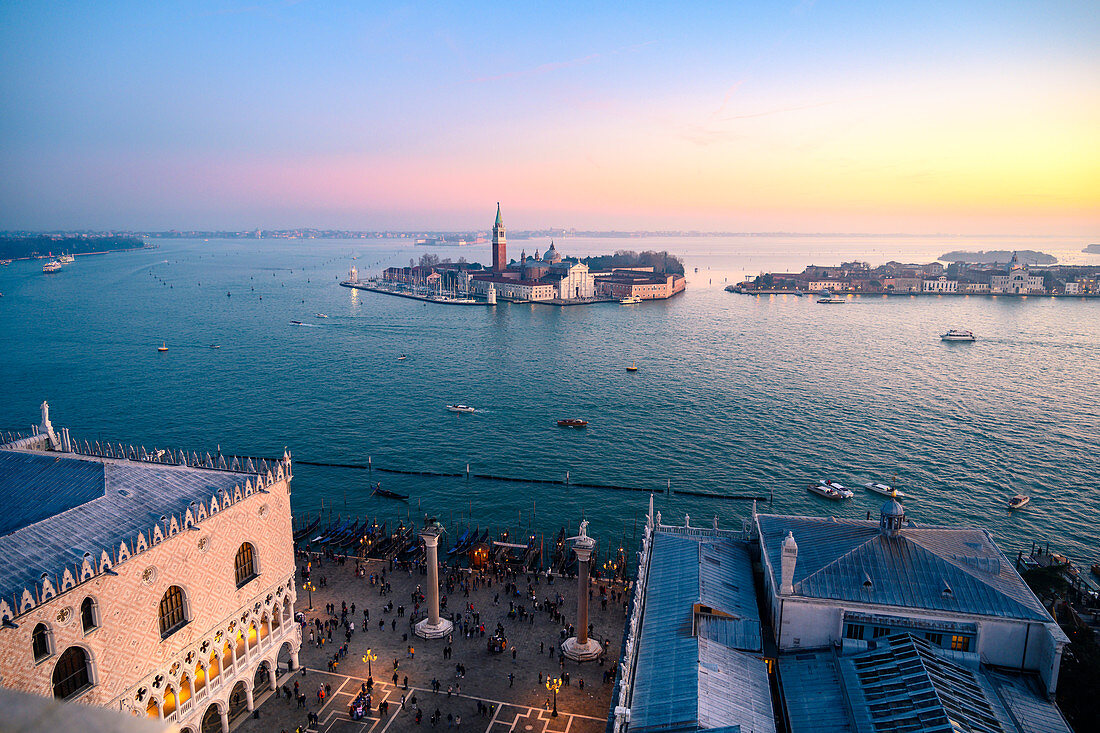 St Mark square and St George island during sunset, as seen from St. Mark Bell Tower. Venice, Veneto, Italy.