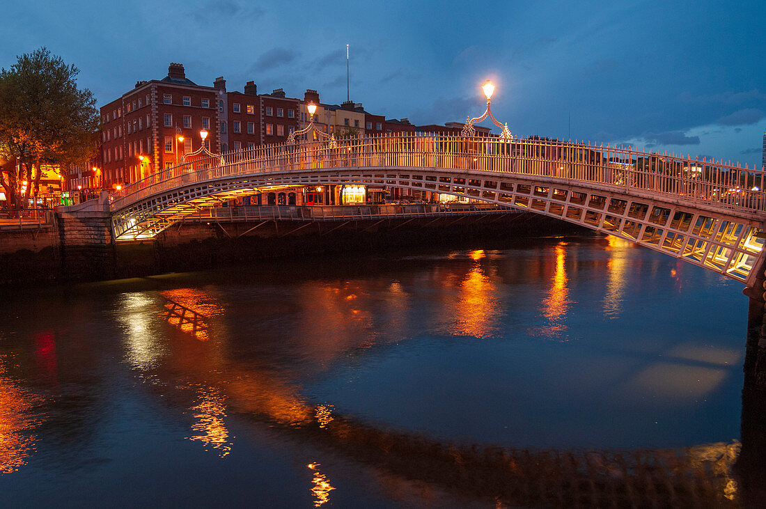 Half Penny Bridge (Ha'Penny Bridge) over Liffey River, Dublin, Ireland.