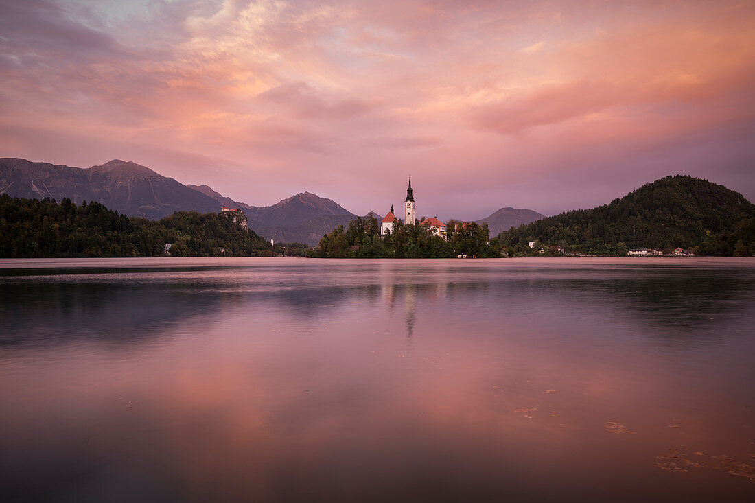 Aerial view of Bled Island with Church of the Assumption at dusk, Lake Bled, Upper Carniola, Slovenia