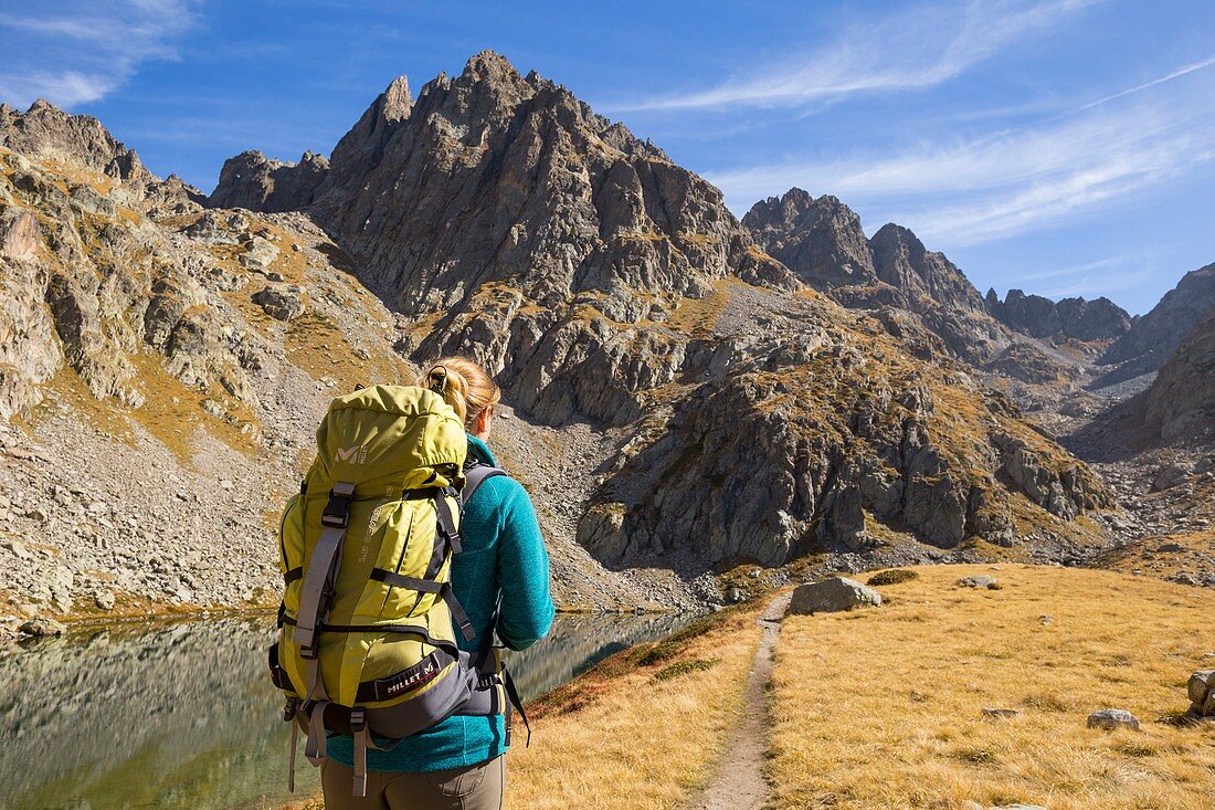 France, Alpes-Maritimes, Mercantour National Park, Gordolasque Valley, hiker walking by lake Autier (2275m)