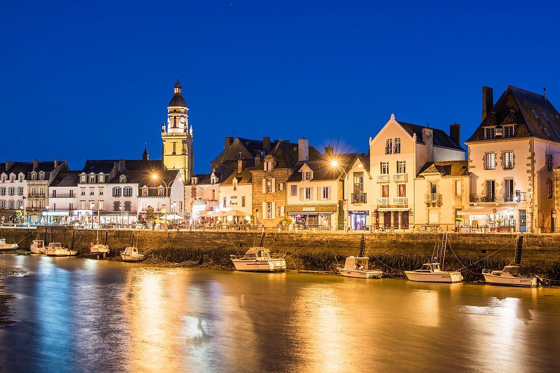 France, Loire Atlantique, Guerande peninsula, Le Croisic, the docks and 15th and 16th centuries Notre Dame de Pitie church, Flamboyant Gothic style, at dusk