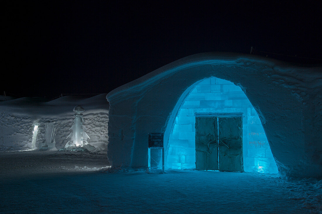 Entrance to the classic Icehotel in Jukkasjarvi near Kiruna in Swedish Lapland; northern Sweden at night.