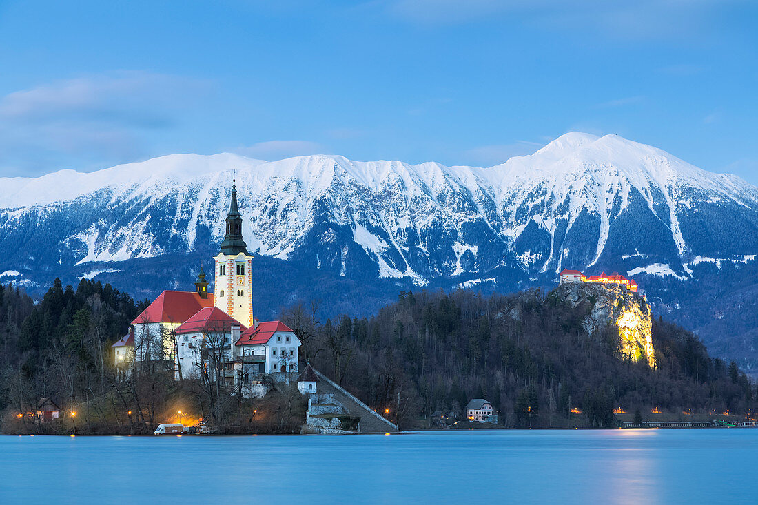 Lake Bled at evening with the snowy Karawanks mountains on the background,Bled, Upper Carniola region, Slovenia, Europe