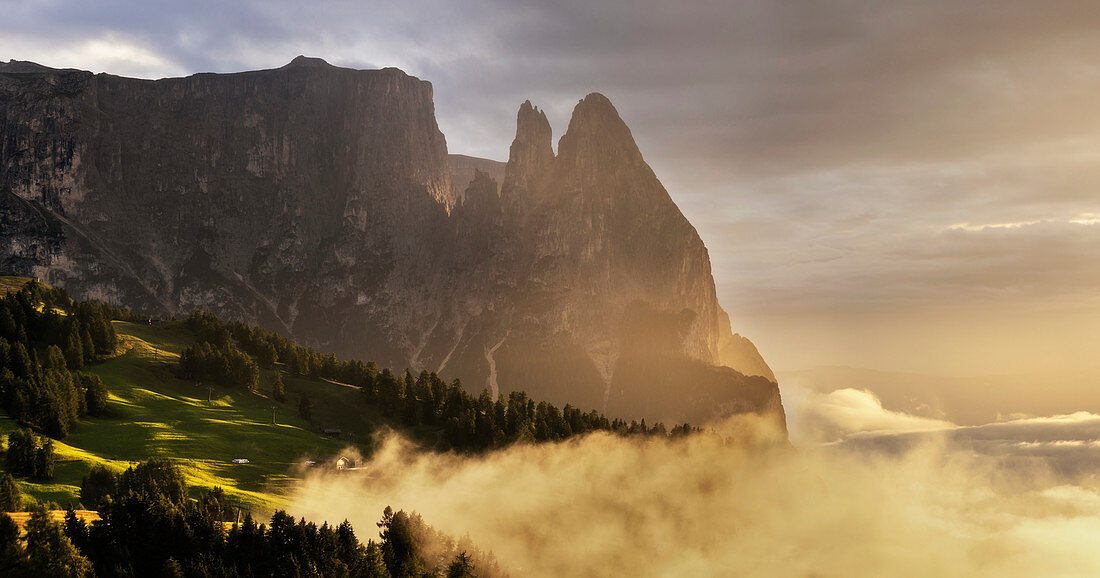 Sunset on the Alpe di Siusi. In the background the peaks of Sciliar. 