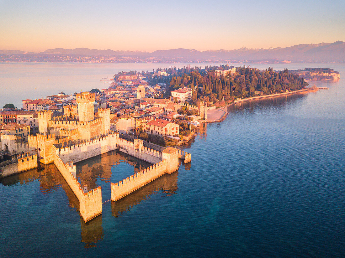 Aerial view at dawn of Sirmione village in Garda lake, Lombardy district, Brescia province, Italy, Europe.