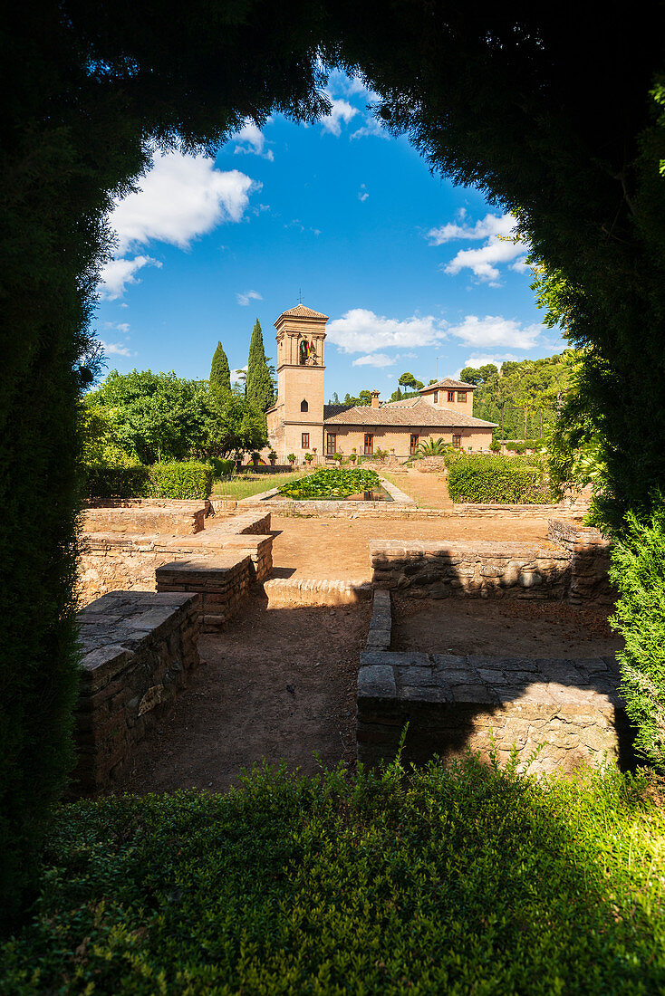 Church of Santa Maria de la Alhambra seen from the surrounding Partal garden (Jardines del Partal), Granada, Andalusia, Spain