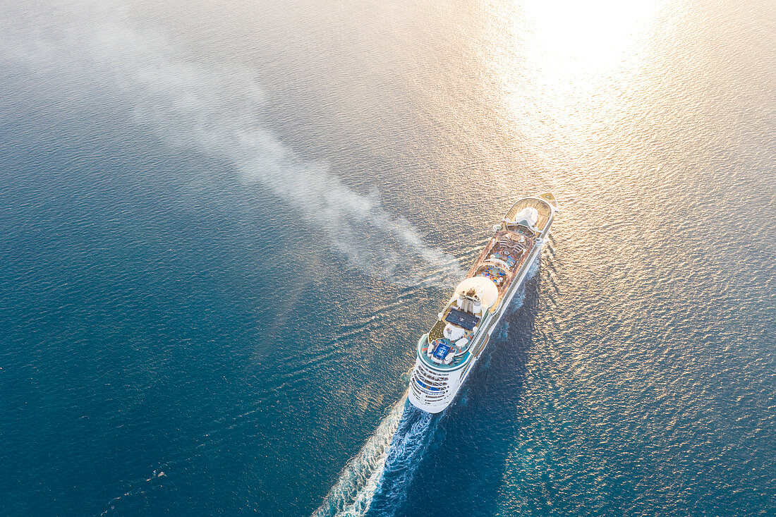 Aerial view of cruise ship sailing in the Caribbean Sea at sunset, Antilles, Central America