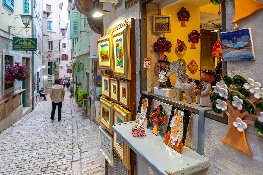 View of local souvenirs on cobbled street in the old town, Rovinj, Istria, Croatia, Adriatic, Europe