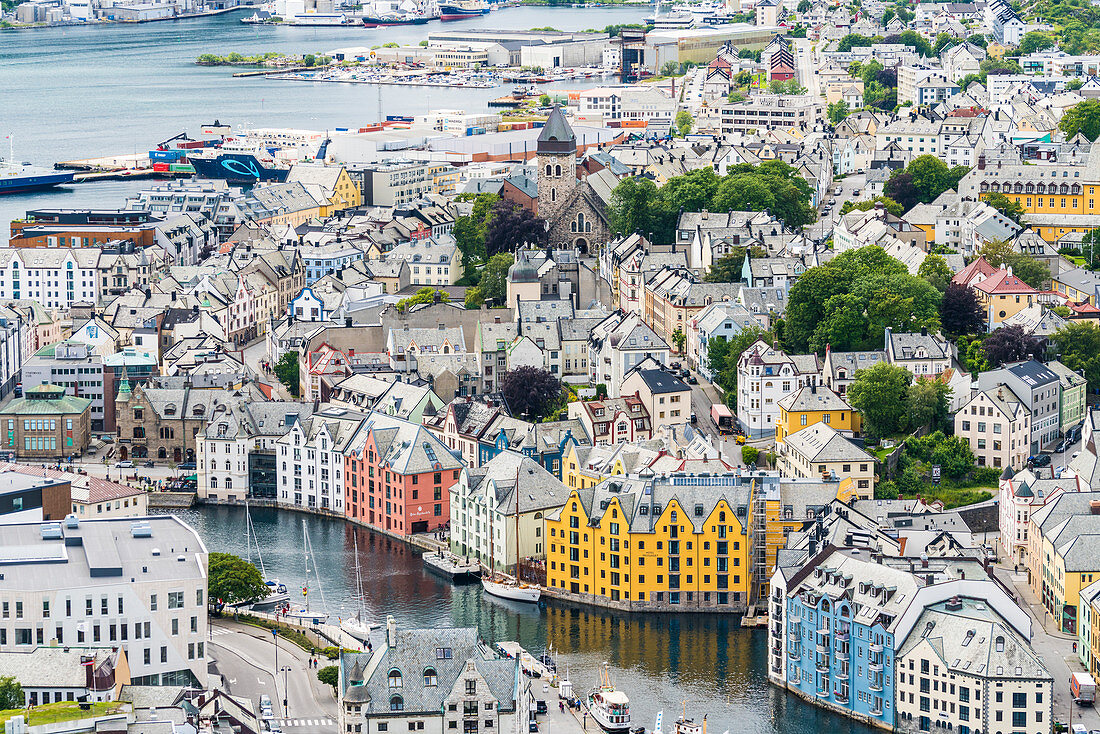 Elevated view of colorful Art Nouveau styled houses along Brosundet canal, Alesund, More og Romsdal county, Norway, Scandinavia, Europe