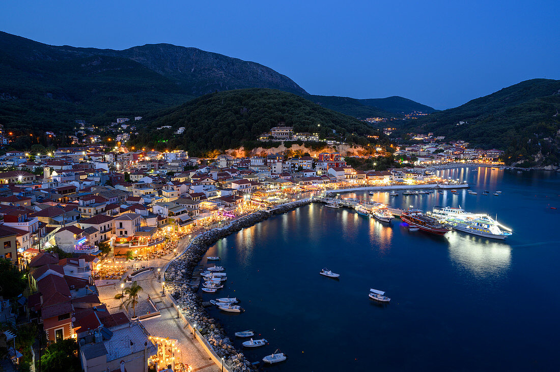 The elevated view of Parga town at night, Parga, Preveza, Greece, Europe