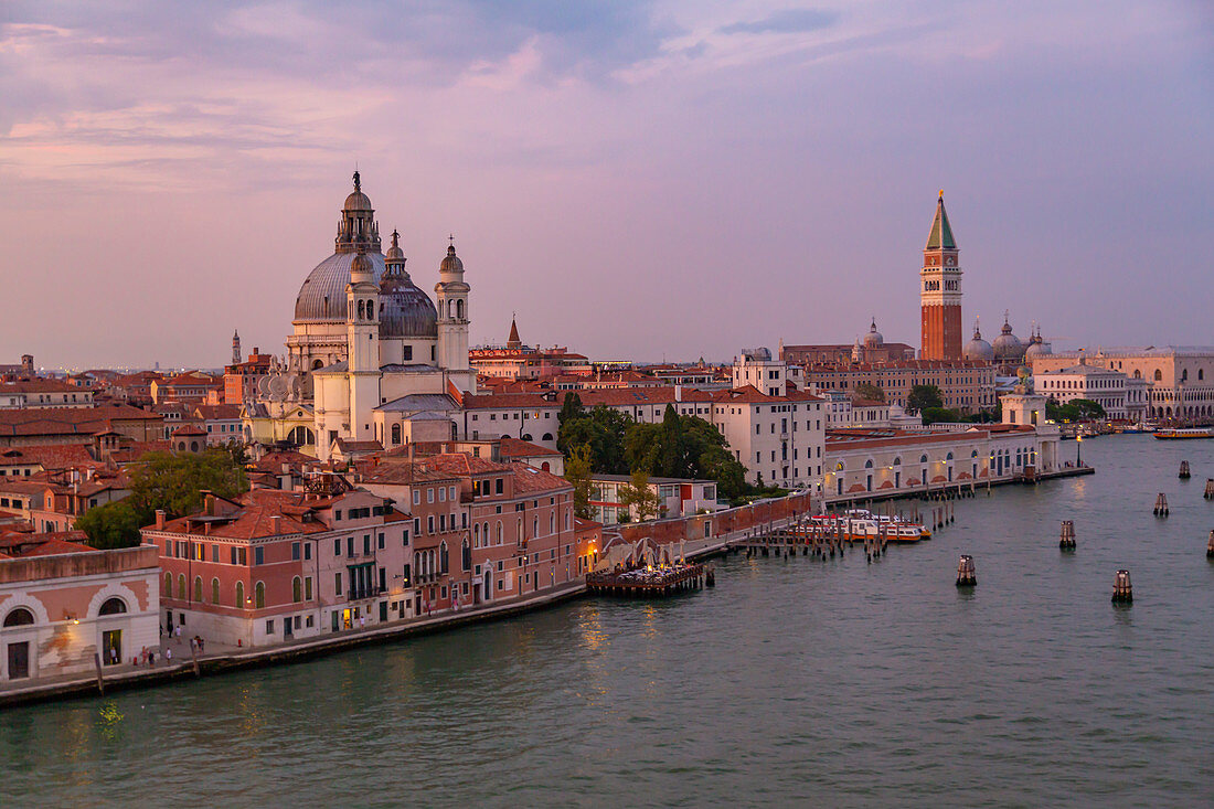 View of Venice skyline from cruise ship at dusk, Venice, UNESCO World Heritage Site, Veneto, Italy, Europe