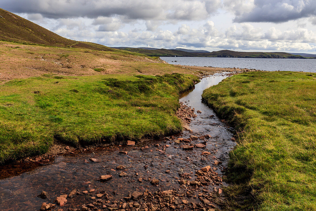Little Ayre, burn, red sand and granite beach and rocks, Muckle Roe Island, Shetland Isles, Scotland, United Kingdom, Europe