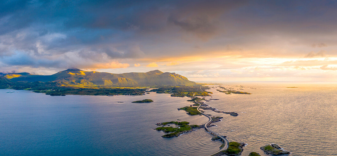 Aerial panoramic of Storseisundet Bridge at sunset, Atlantic Road, More og Romsdal county, Norway, Scandinavia, Europe