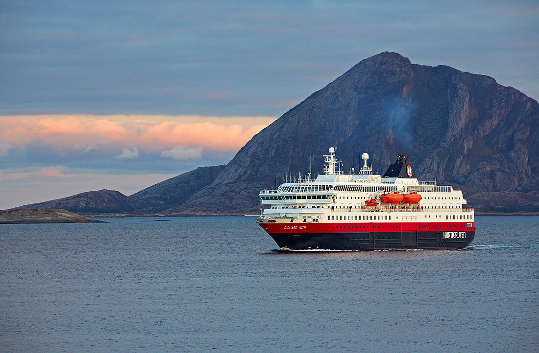 Hurtigruten ship Richard With in front of the island Bolga in the Rödöyfjorden, Rödöyfjord, Roedoeyfjorden, Roedoeyfjord, Helgeland coasts, Nordland province, Salten, Norway, Europe