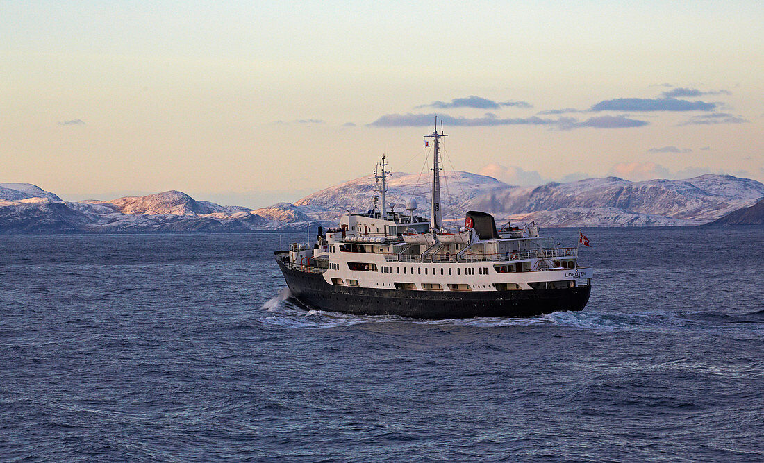 Hurtigruten ship MS Lofoten in front of Havöysund, Havöya Island, Breisundet, Finnmark Province, Vest-Finnmark, Norway, Europe