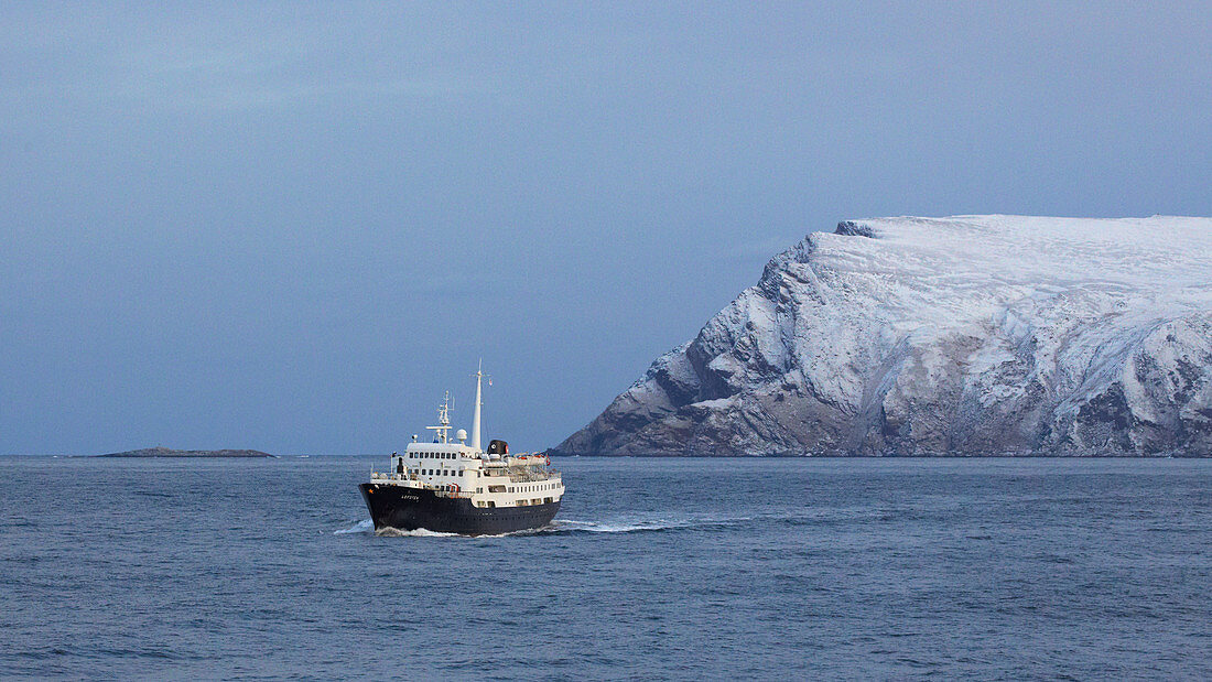 Hurtigruten ship MS Lofoten in front of Havöysund, Hjelmsöya Island, Breisundet, Finnmark Province, Vest-Finnmark, Norway, Europe