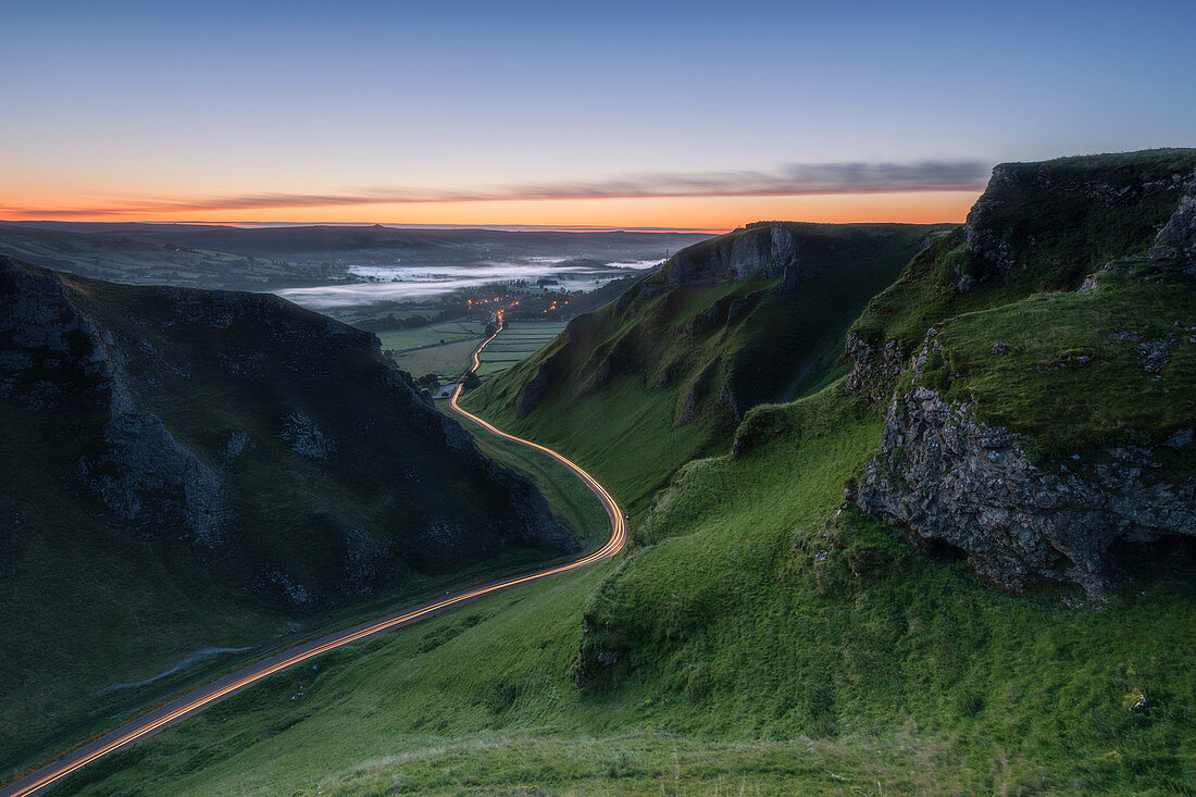 Winnats Pass at sunrise with car light trails, Winnats Pass, Hope Valley, Peak District, Derbyshire, England, United Kingdom, Europe