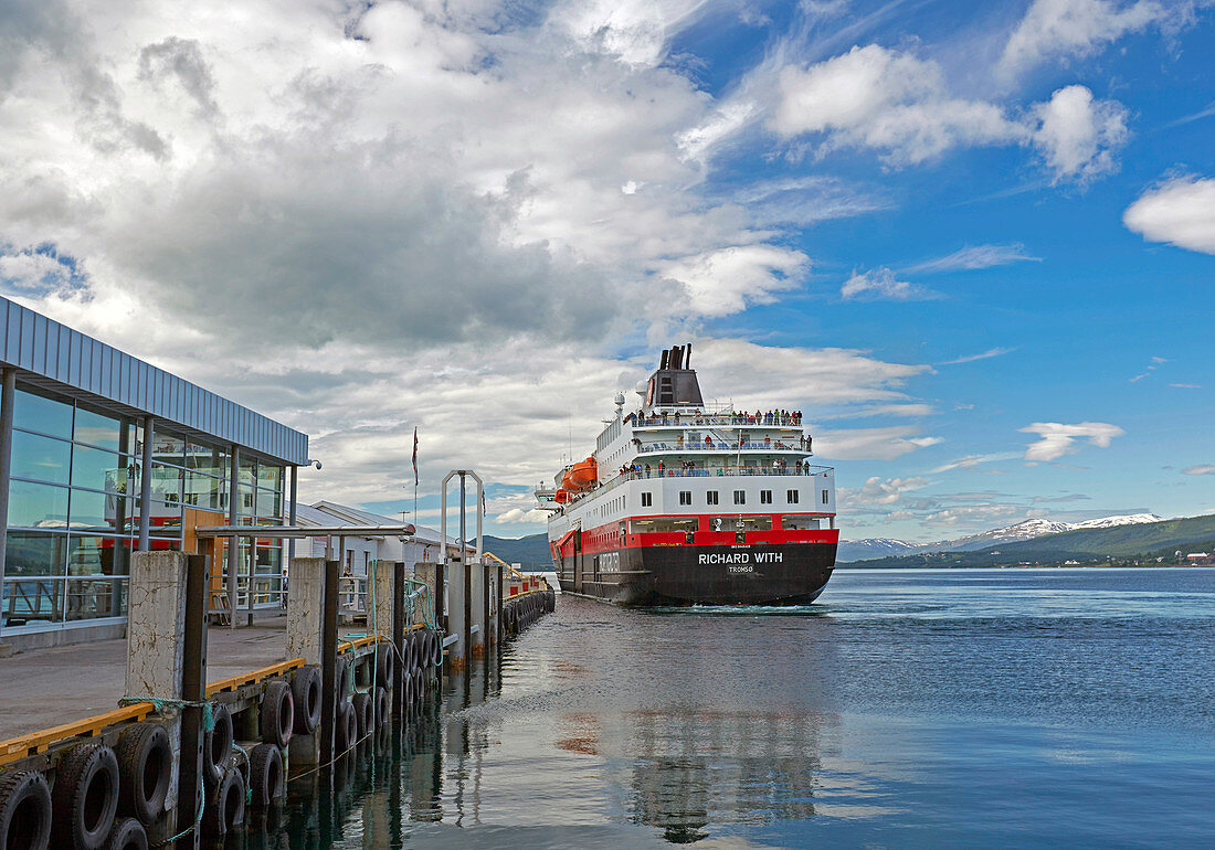 Hurtigruten - ship in Finnsnes on Gisundet, Senja island, Troms, Norway, Europe