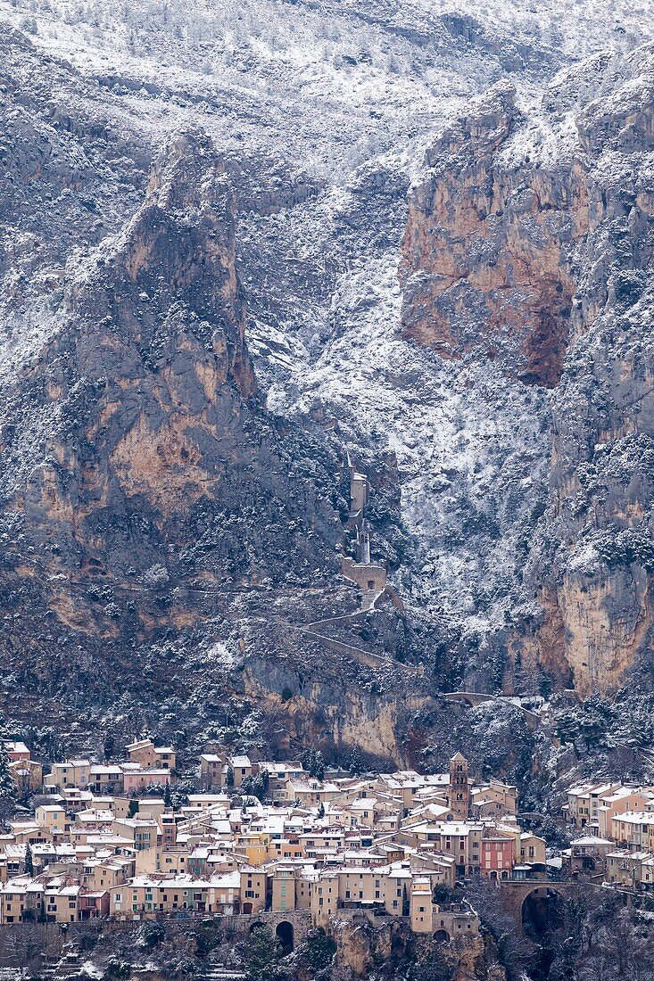 France, Alpes de Haute Provence, regional natural reserve of Verdon, Moustiers Sainte Marie, certified the Most beautiful Villages of France, overview of the village after a snowfall