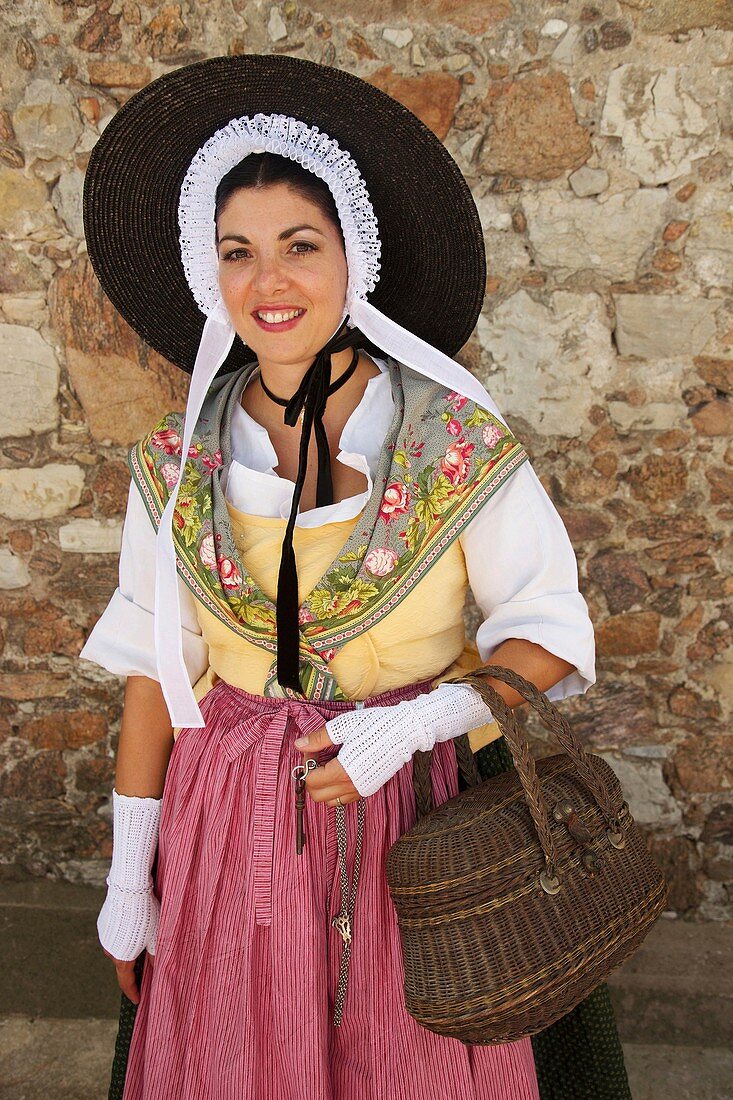 France, Alpes Maritimes, Cannes, Dancer in traditional provencal costume in the old district of the Suquet