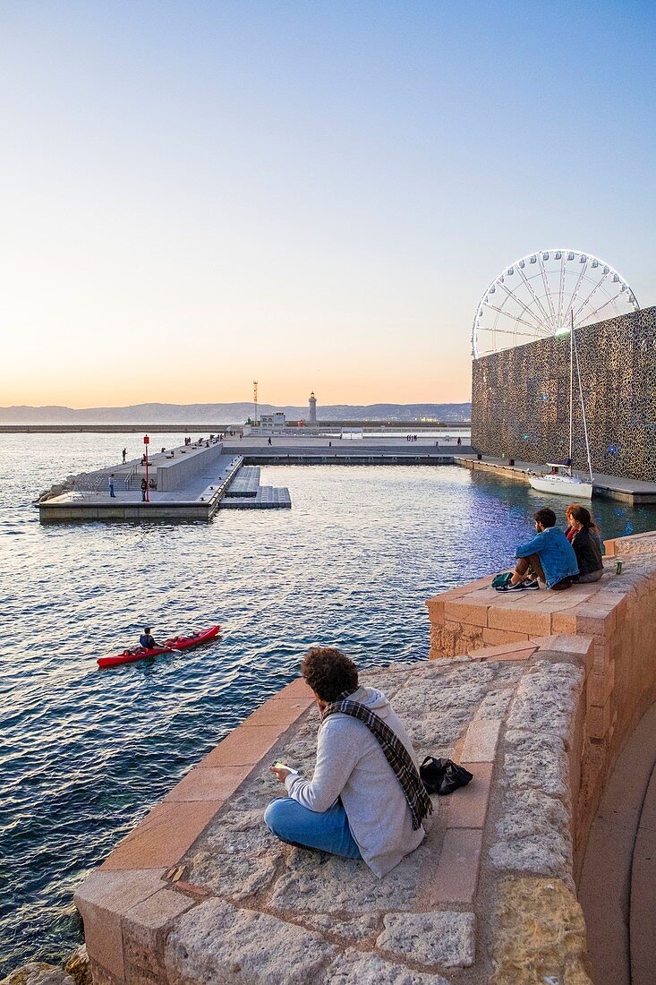 France, Bouches du Rhone, Marseille, sunset on the ramparts of Fort Saint Jean with the Mucem