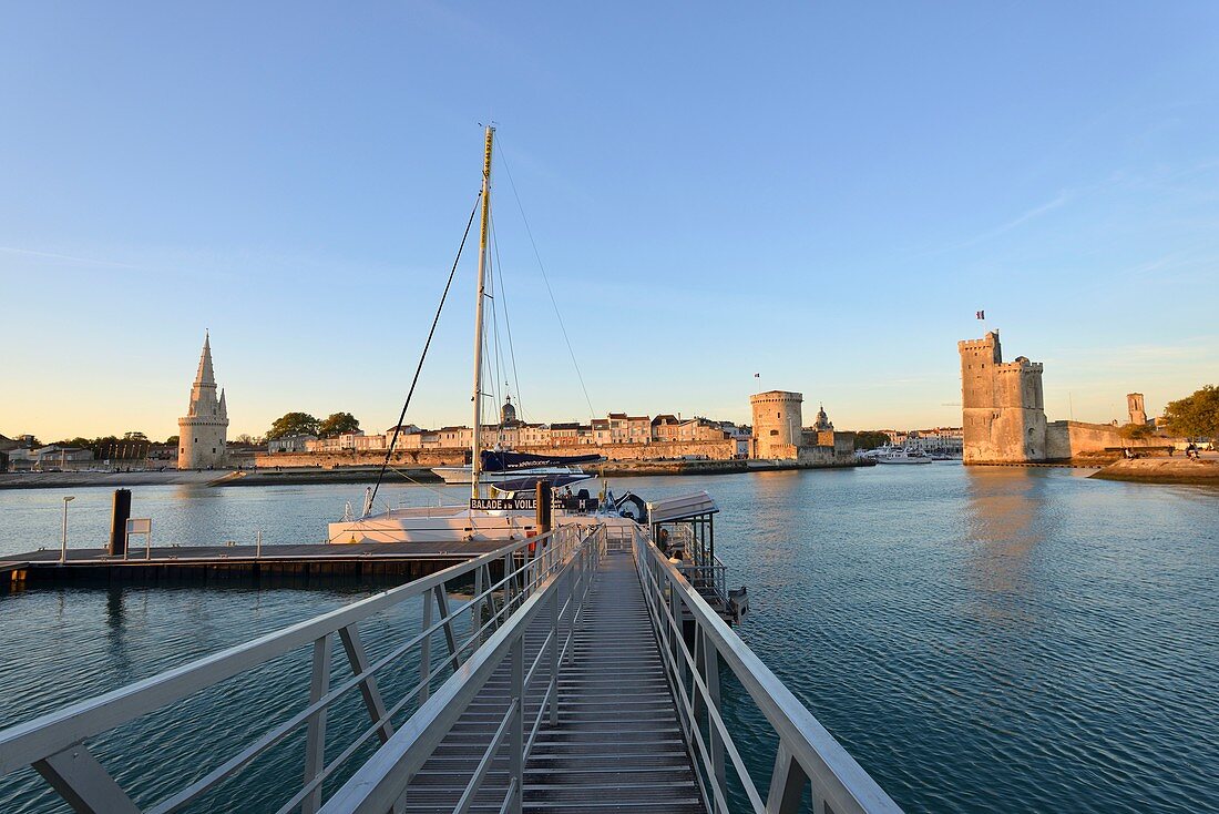 France, Charente-Maritime, La Rochelle, Tour de la Lanterne (Lantern tower), Chain tower (tour de la Chaine) and Saint Nicolas (tour Saint-Nicolas) tower protect the entrance to the Old Port