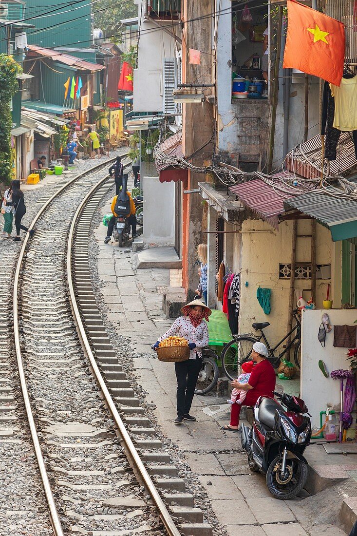 View of Hanoi train street between Le Duan and Kham Thin Street in Hanoi old quarter, Hanoi, Vietnam, Asia 