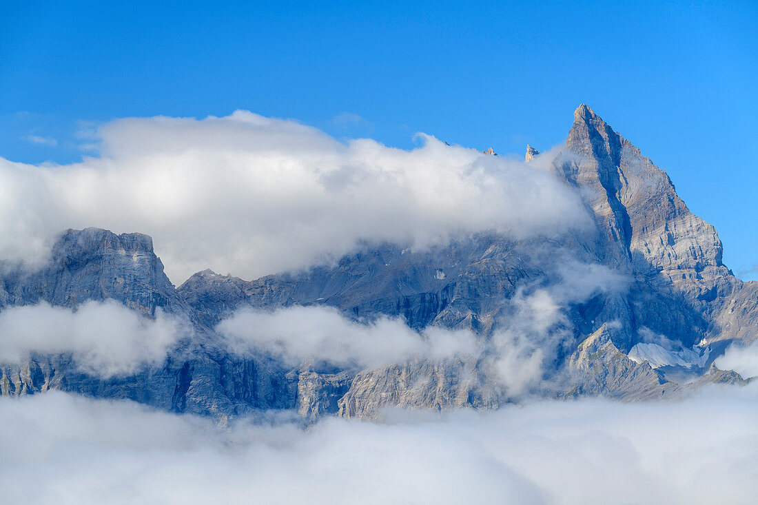 Summit of Dents du Midi protruding from clouds, from Dent de Morcles, Bernese Alps, Vaud, Vaud, Switzerland