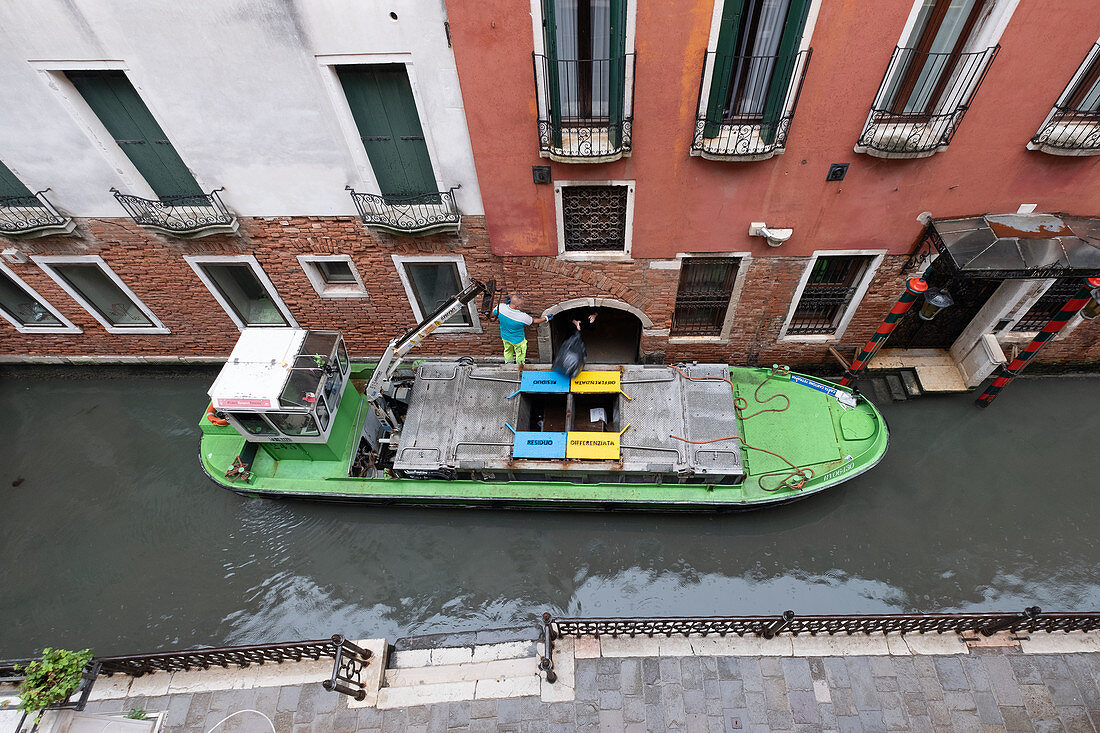 In Venice, the garbage collection comes by ship, San Marco, Venice, Veneto, Italy, Europe
