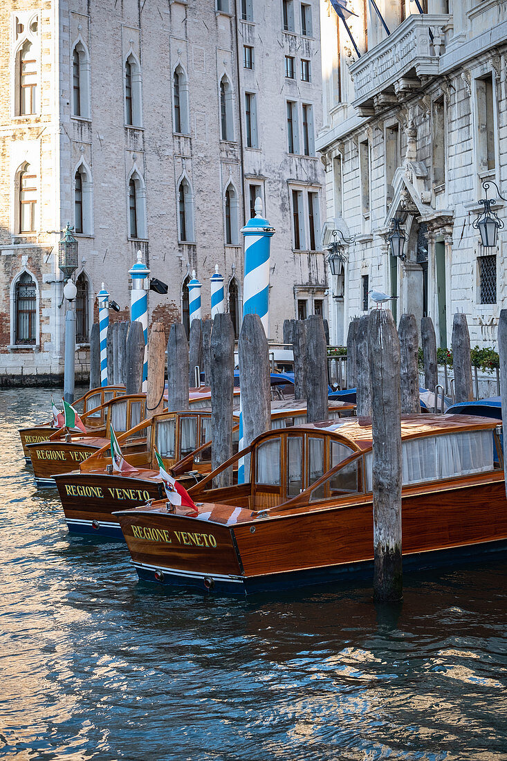 Detail view of wooden boats on the Grand Canal, Venice, Veneto, Italy, Europe