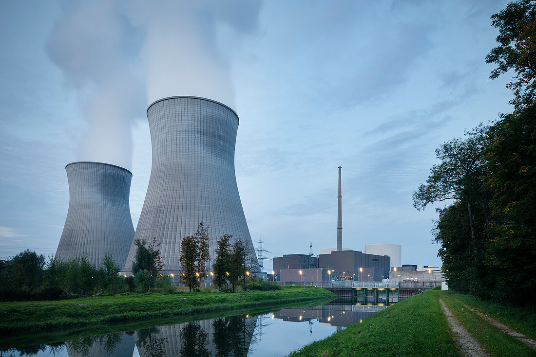 Steam rises from cooling tower of nuclear power plant (AKW) near Gundremmingen, Günzburg district, Bavaria, Danube, Germany