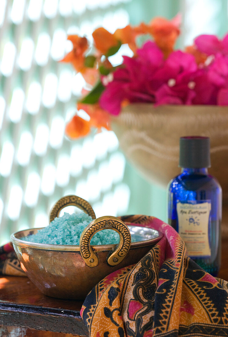 Detail shot Spa treatment products, salts, oils and flowers. St. Lucia, West Indies.
