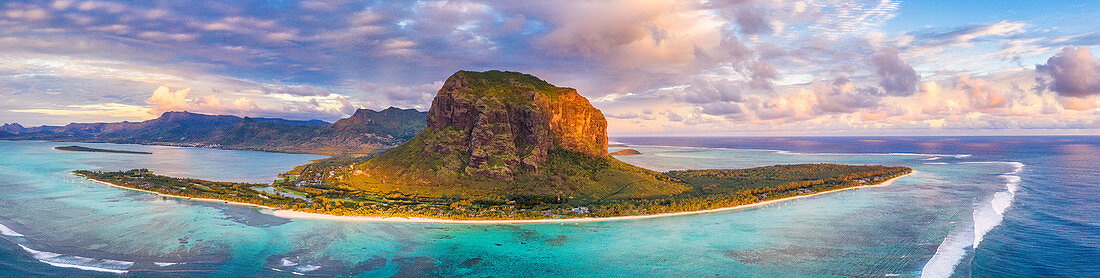 Aerial panoramic of Le Morne Brabant peninsula and turquoise coral reef at sunset, Black River, Mauritius, Indian Ocean, Africa