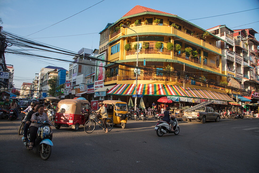 Street scene with mopeds, Phnom Penh, Cambodia, Asia