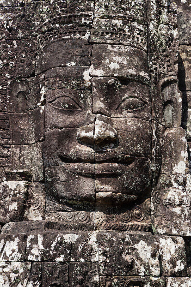 Huge faces carved in stone at the Bayon Temple, Angkor Wat, near Siem Reap, Siem Reap Province, Cambodia, Asia