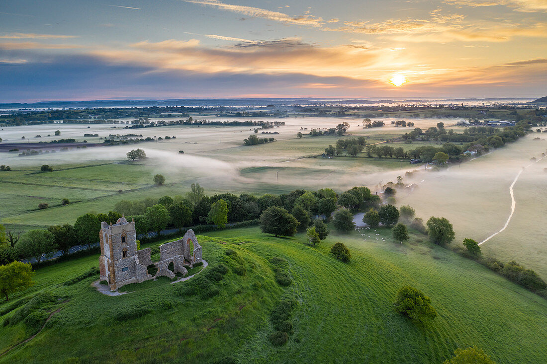 The ruins of St Michael's Church at sunrise in spring, Burrow Mump, Somerset, England, United Kingdom, Europe