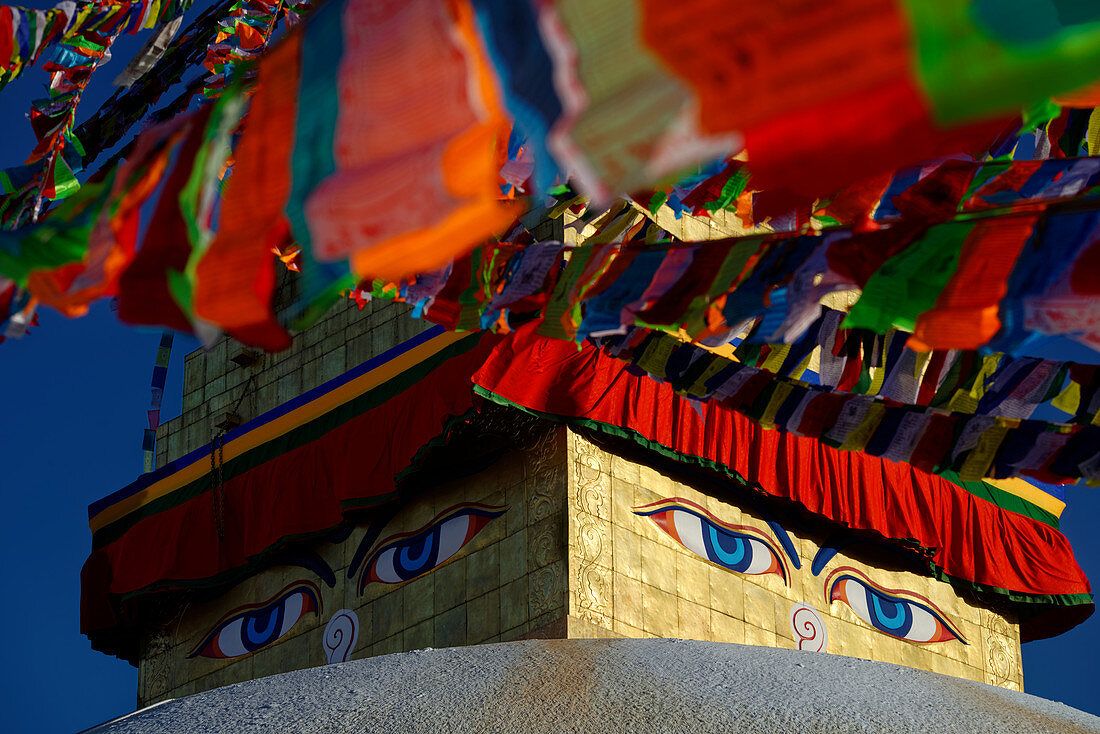 Buddha's eyes at the stupa of Bodnath, Kathmandu, Nepal, Asia.