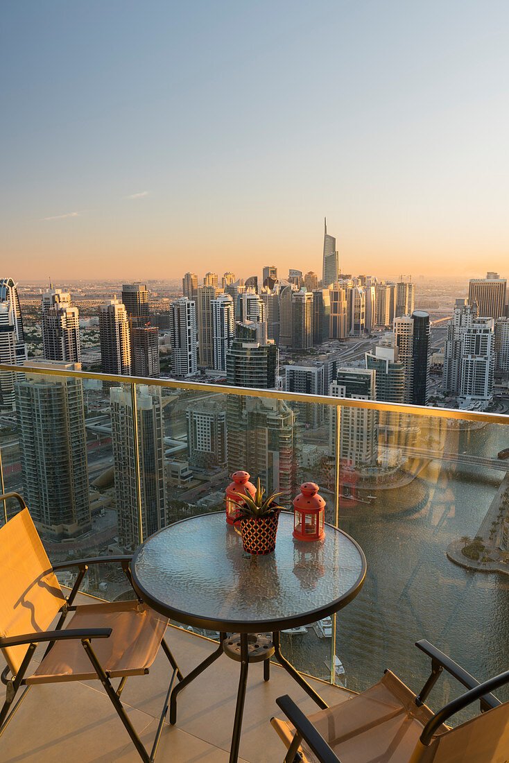View from an apartment over the Dubai Marina, table with chairs, terrace, Dubai, United Arab Emirates