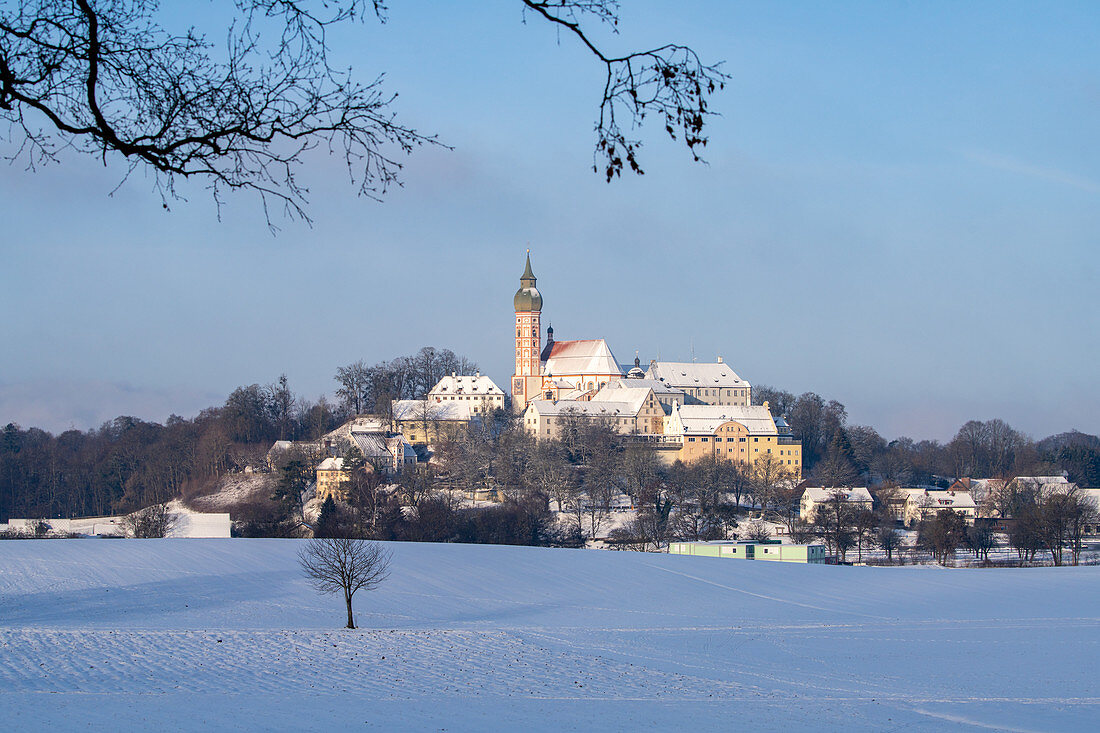 Andechs Monastery in a snowy winter landscape, Andechs, Bavaria, Germany.