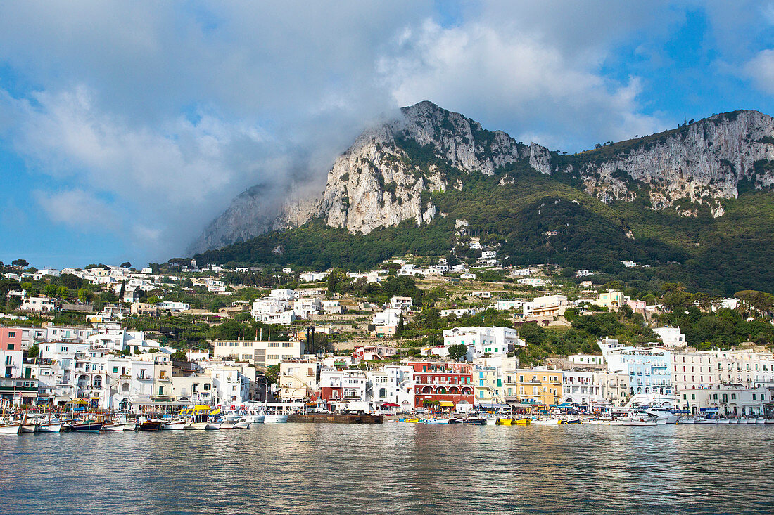 View from sea at the Marina Grande and mountain in Capri, Italy